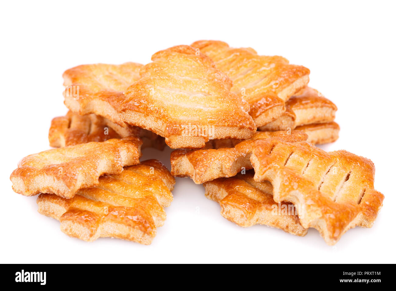 Fir-tree shape cookies isolated on white background. Stock Photo