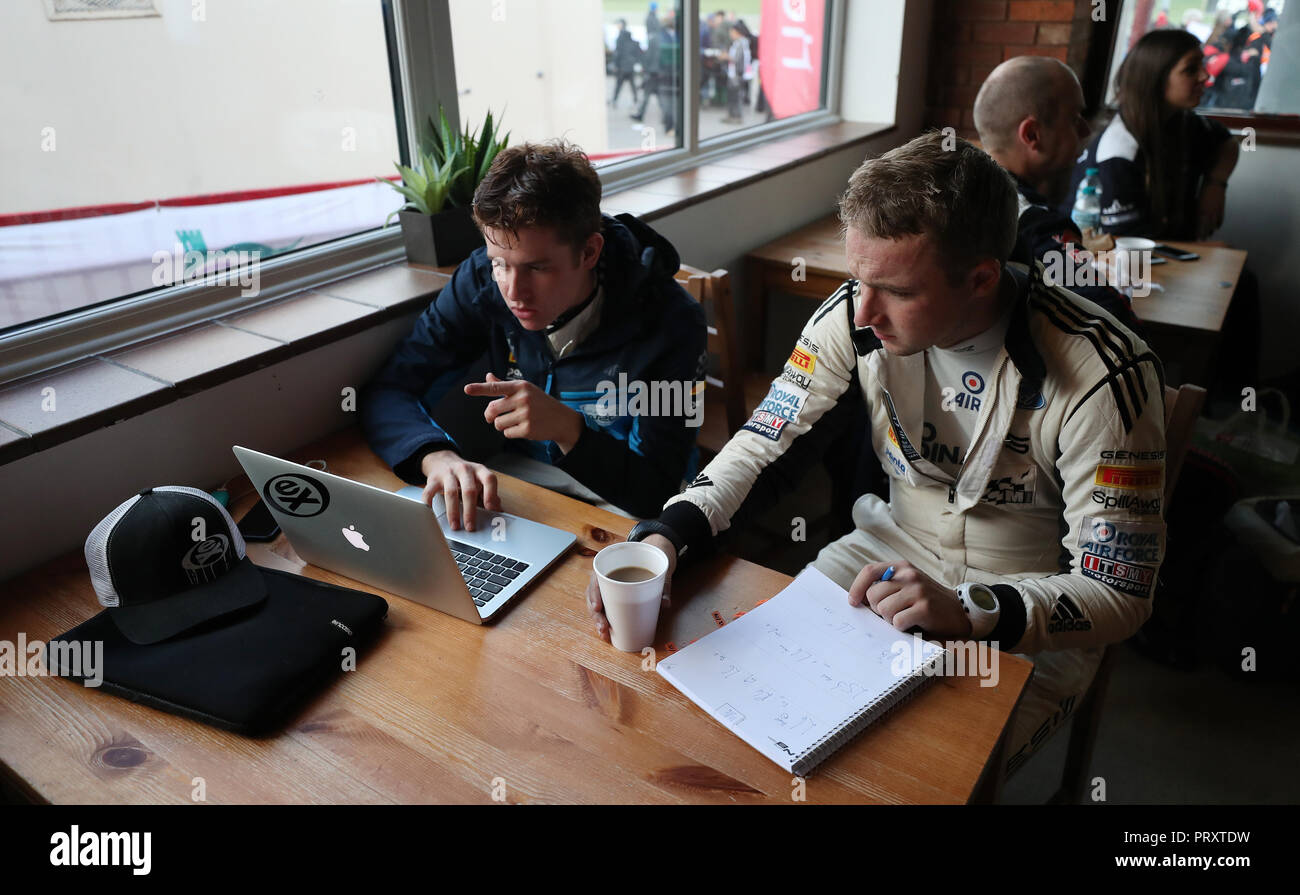 Driver and navigator check stage notes during day one of the DayInsure Wales Rally GB. PRESS ASSOCIATION Photo. Picture date: Thursday October 4, 2018. See PA story AUTO Rally. Photo credit should read: David Davies/PA Wire. RESTRICTIONS: Editorial use only. Commercial use with prior consent from teams. Stock Photo