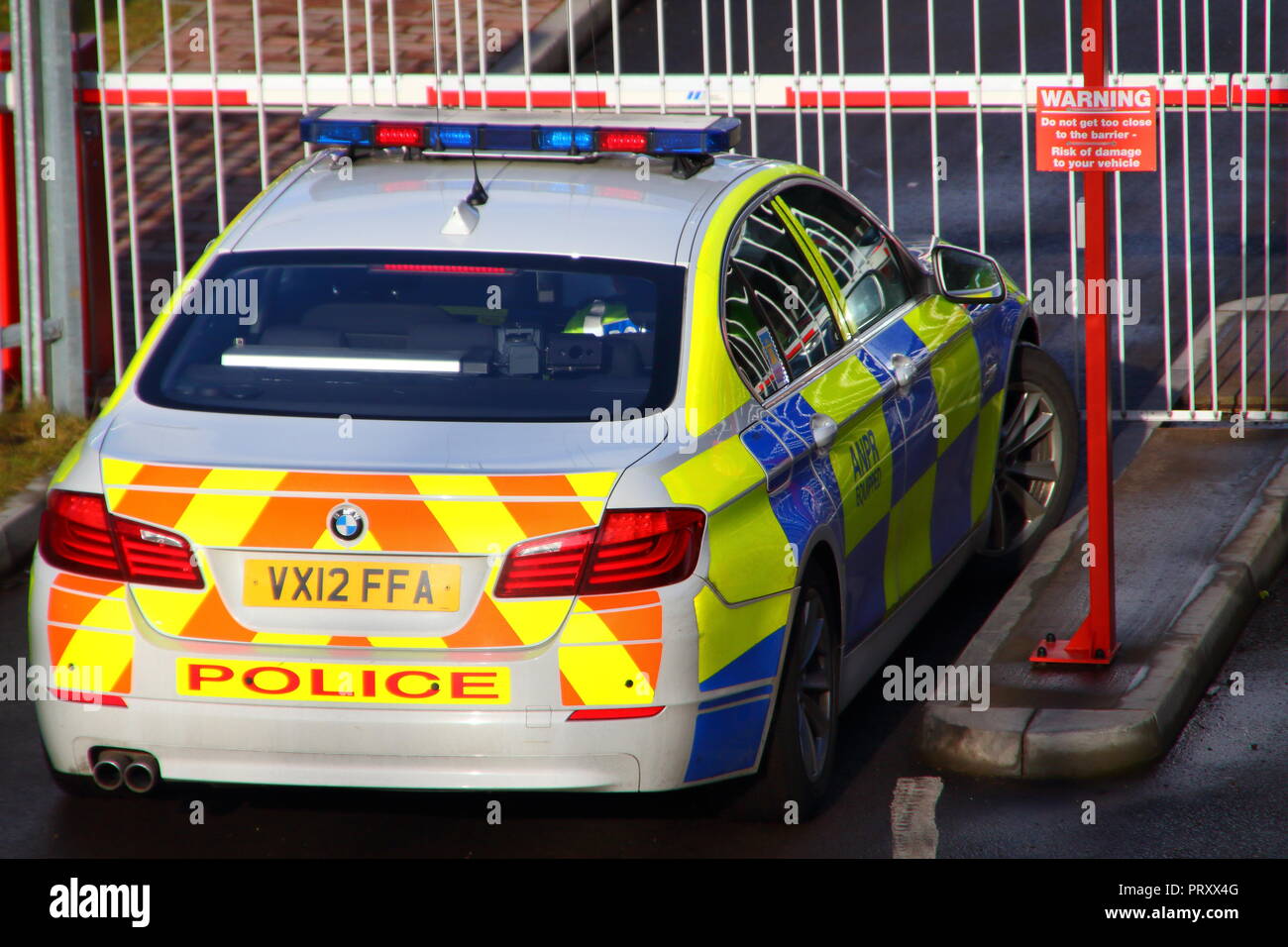 A bmw police patrol car at the entrance to the Central Motorway Police Group Headquarters at Perry Barr in Birmingham. Stock Photo