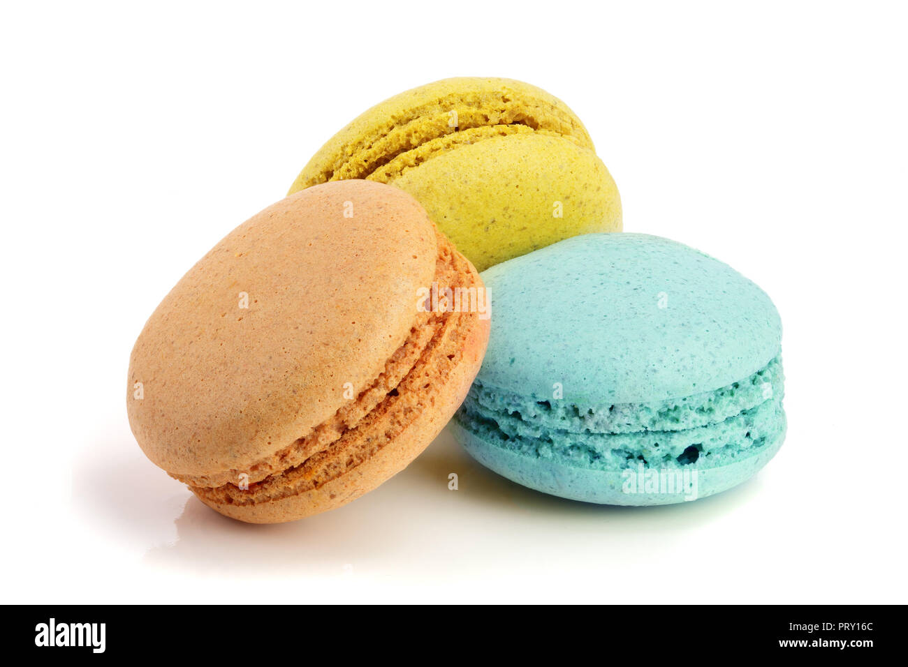 three macaroons isolated on white background closeup Stock Photo - Alamy