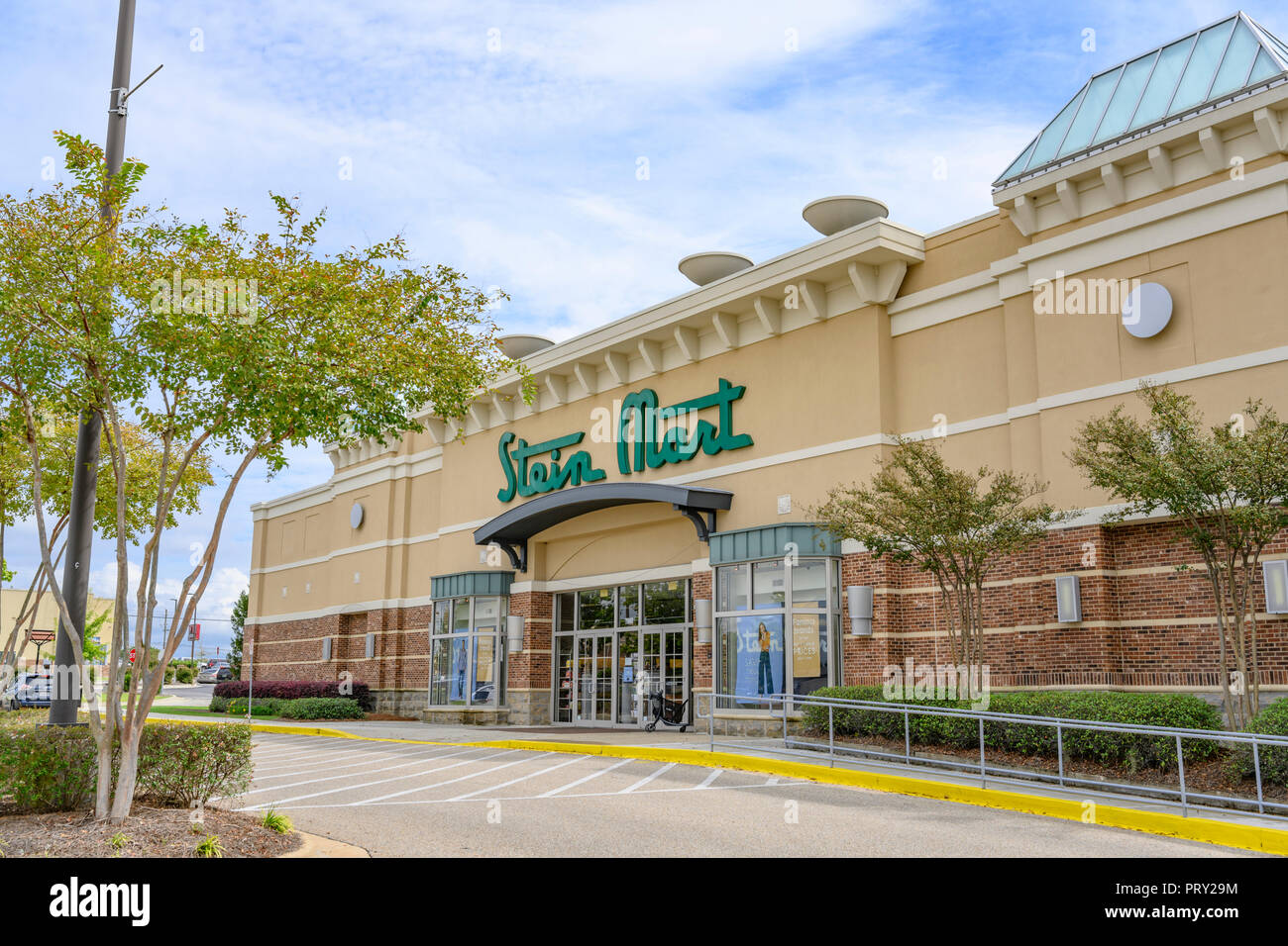 Stein Mart department store front exterior entrance with the company logo sign on the building in Montgomery, Alabama USA. Stock Photo