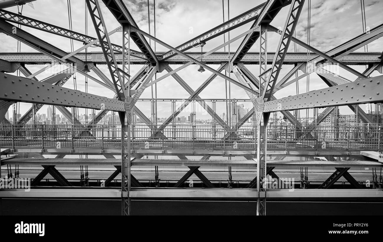 Black and white picture of the Williamsburg Bridge, connecting Manhattan with Brooklyn, New York, USA. Stock Photo