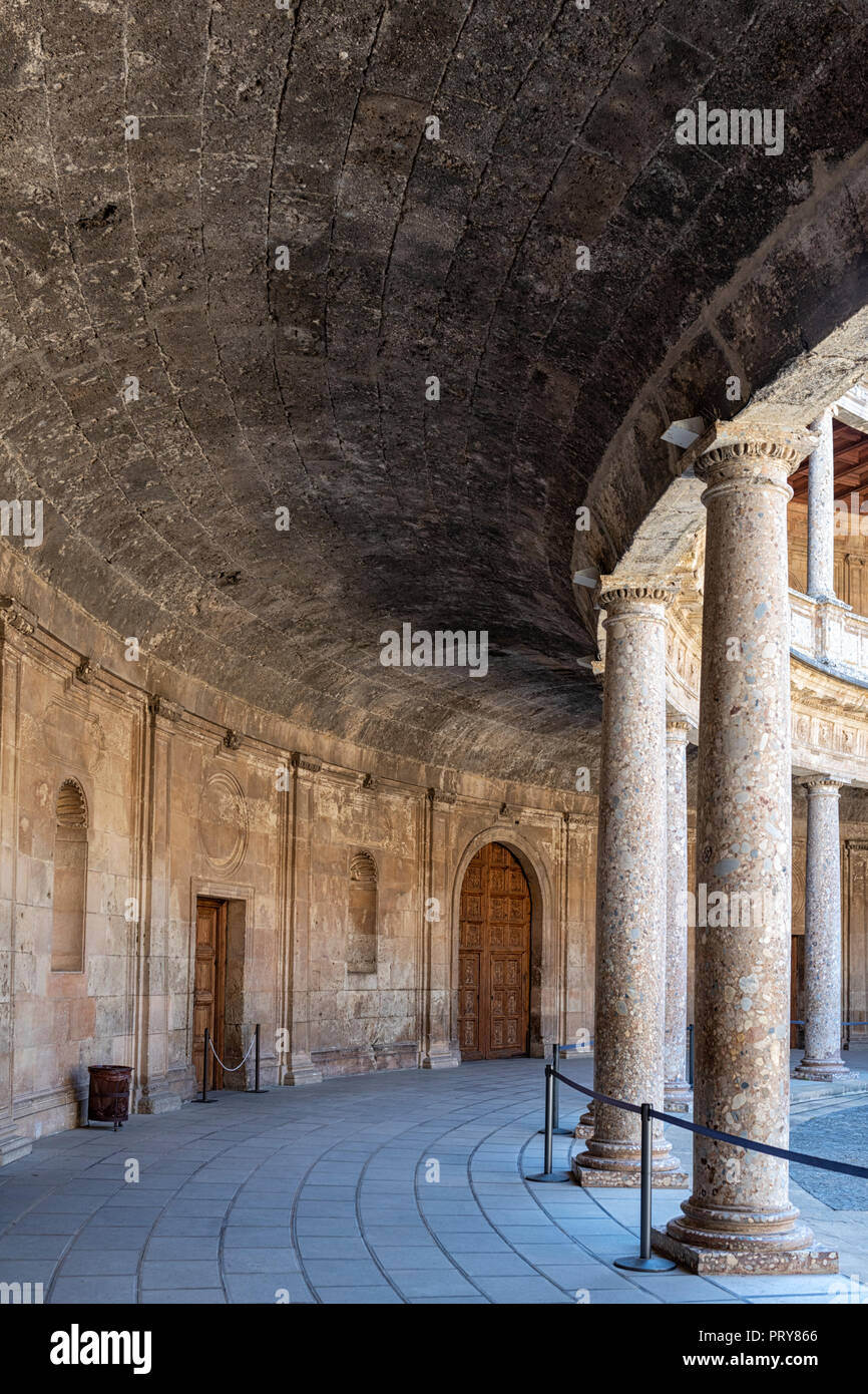 Circular corridor around the courtyard of the palace of Carlos V Stock Photo