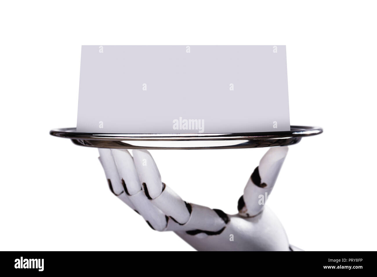 Robotic Hand Holding Blank Card On Plate Over White Background Stock Photo