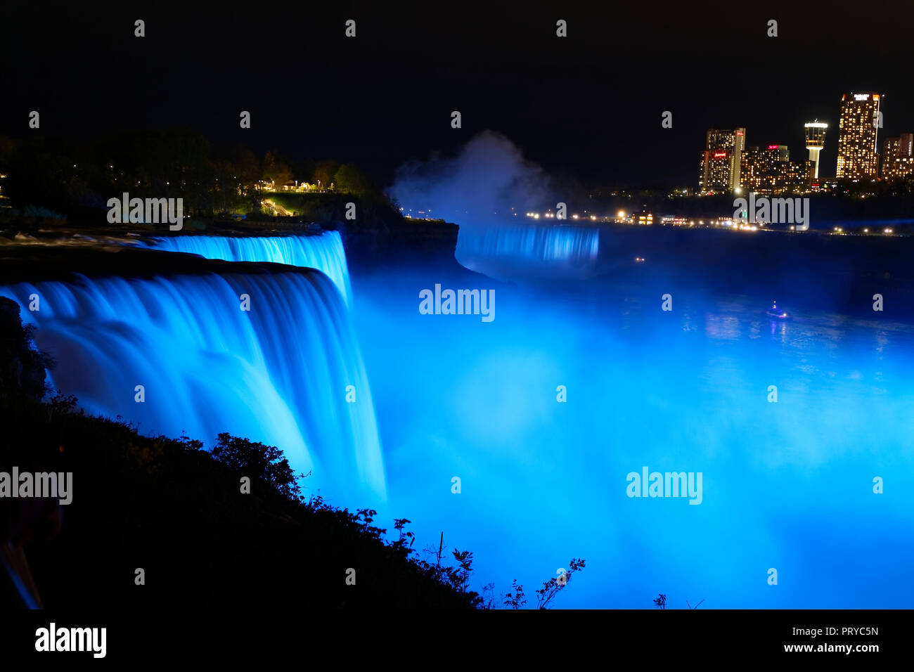 Niagara Falls at night and fireworks Stock Photo Alamy