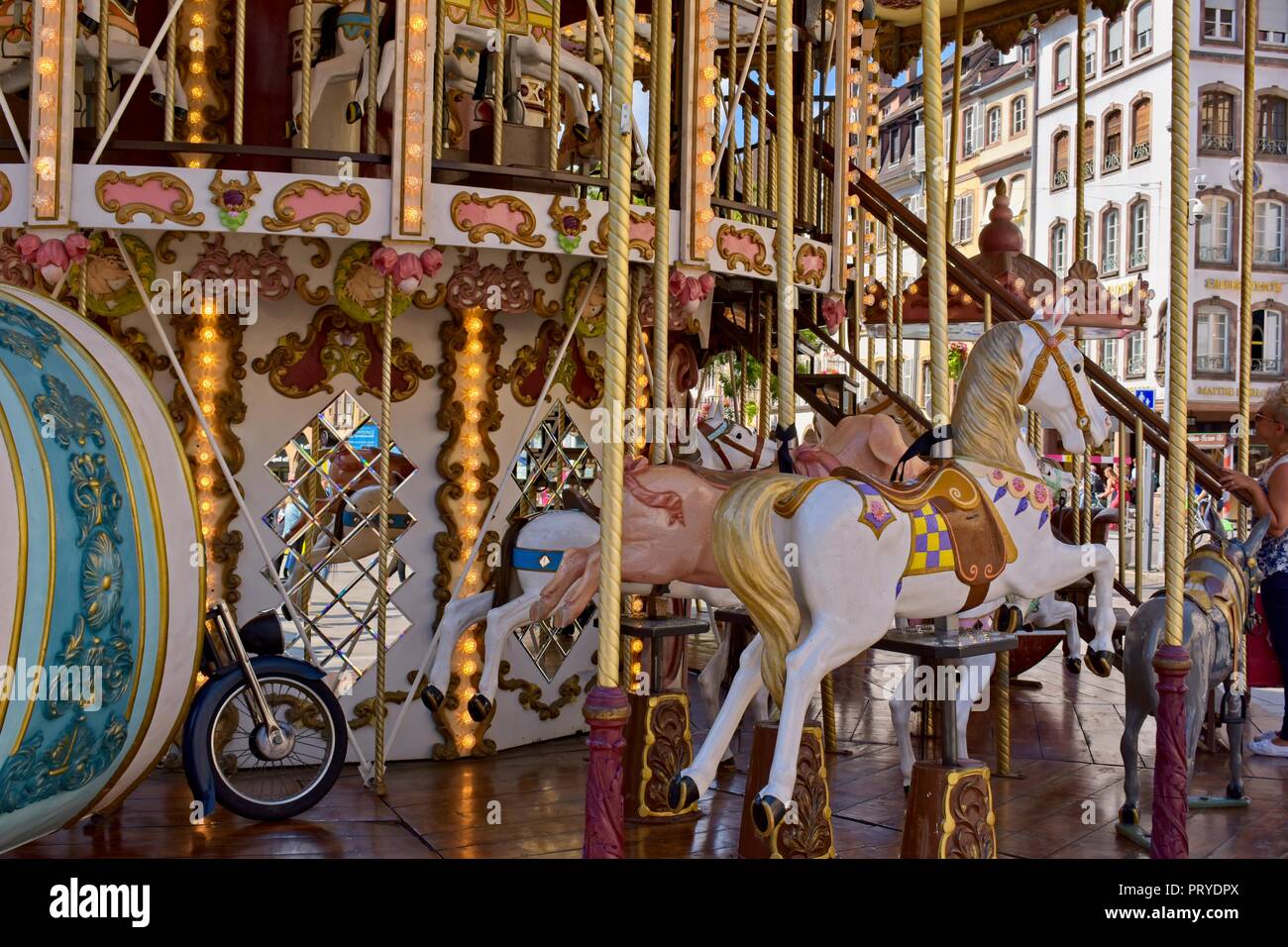 Old fashioned Merry go round at Place Gutenberg in Strasbourg, France Stock Photo