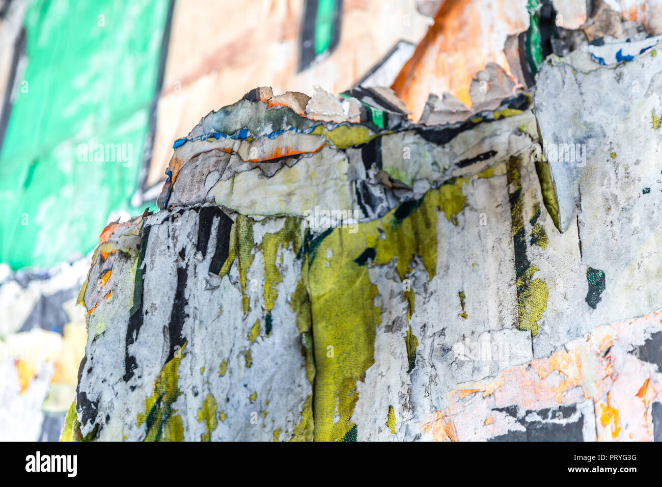 Advertisement Using Texture wall background of abstract texture of remnants of advertising Posters ...