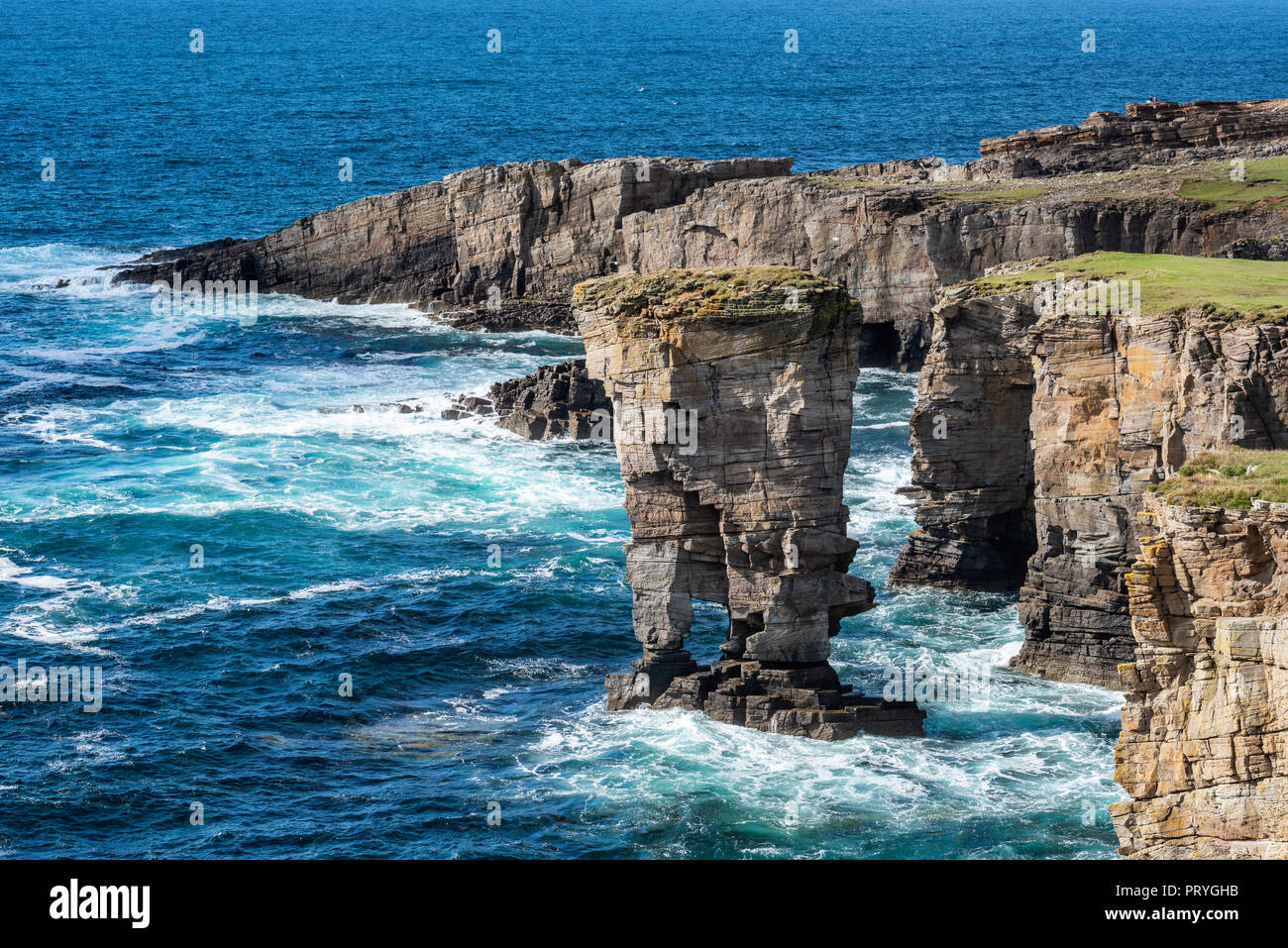 The 35m high surf pillar, called Yesnaby Castle, Sandwick, Mainland, Orkney Islands, Scotland, Great Britain Stock Photo