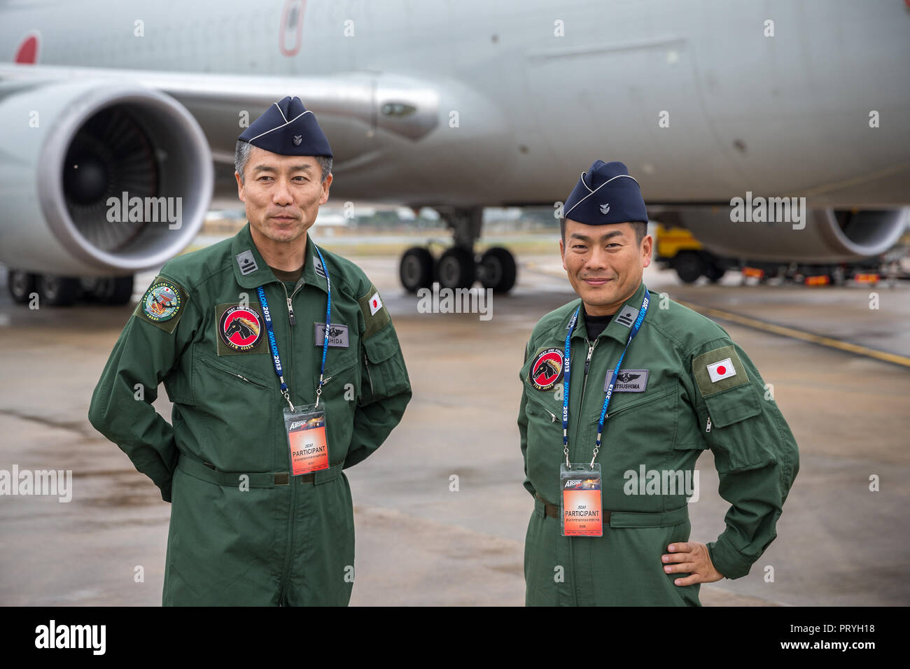 Japan Air Self Defense Force (JASDF) air crew from 404 Squadron, 1st Tactical Airlift wing in front of a Boeing 767 transport aircraft. Stock Photo