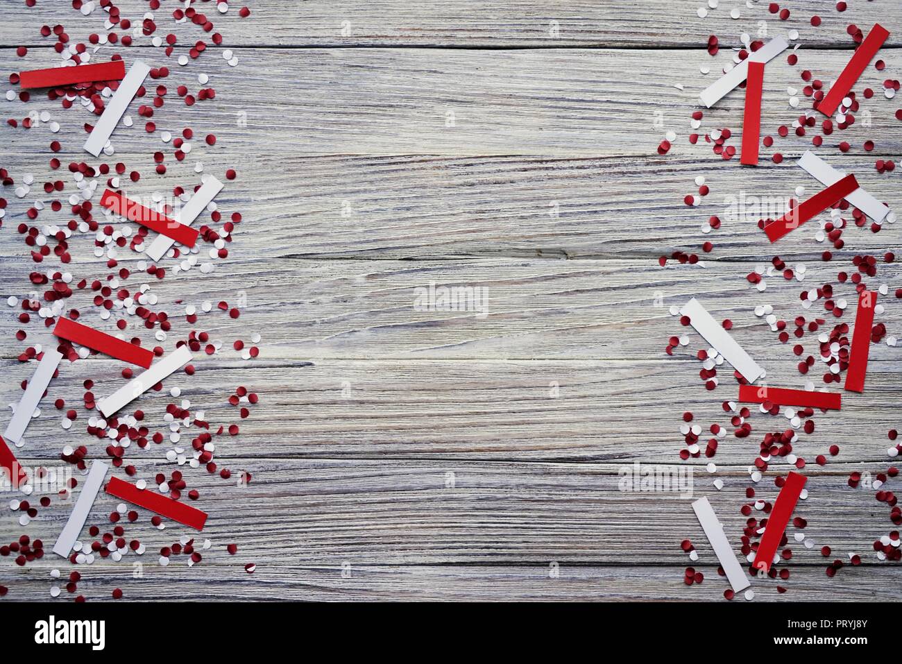 concept-independence day of Turkey, national paper flags of the state of Turkey with white red confetti on a white brushed wooden background, horizont Stock Photo