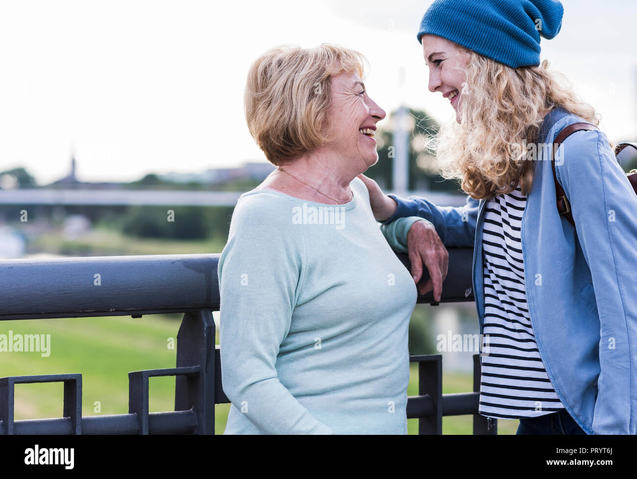 Happy grandmother and granddaughter face to face Stock Photo
