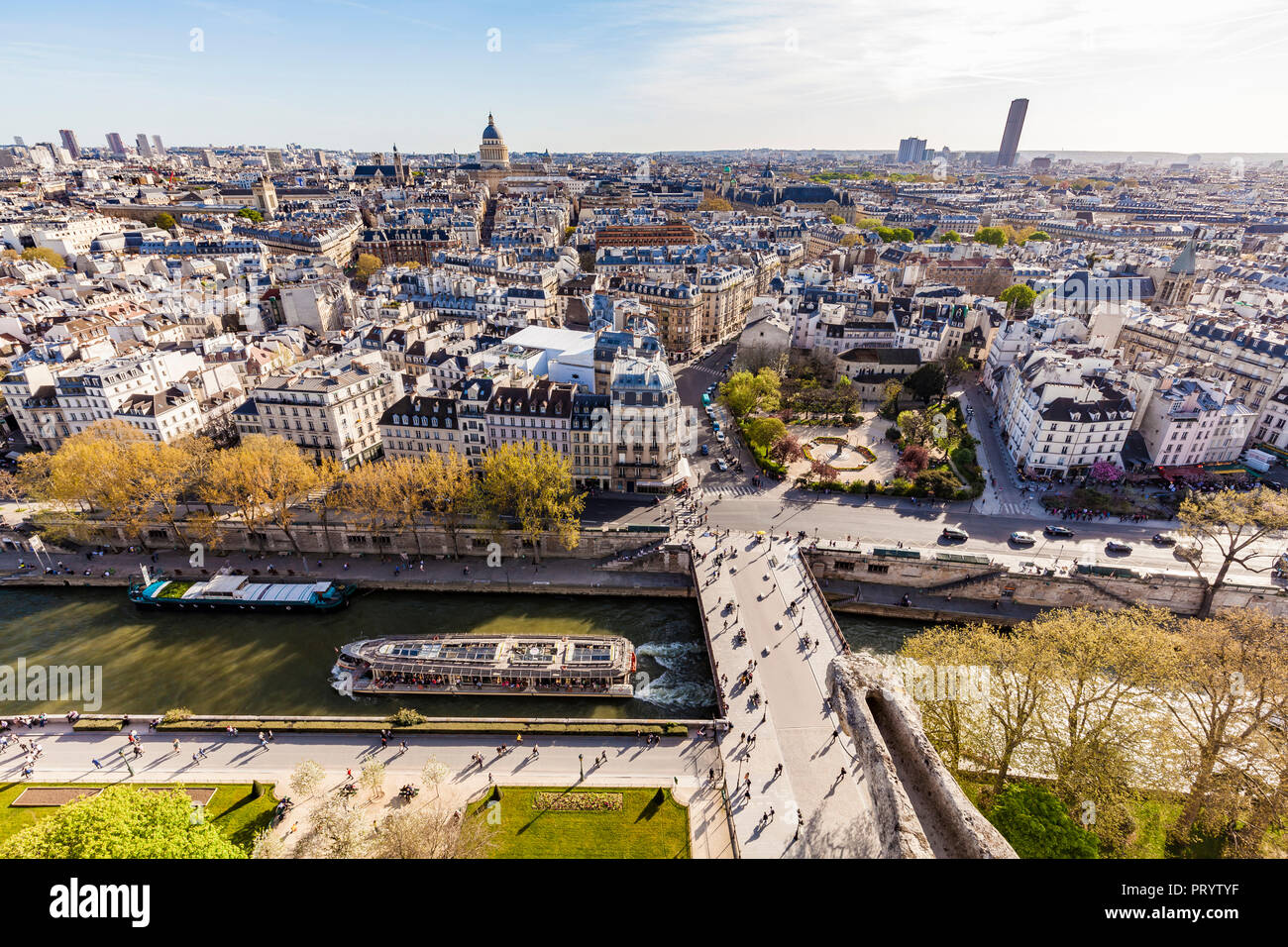 France, Paris, City center with tourist boat on Seine river Stock Photo