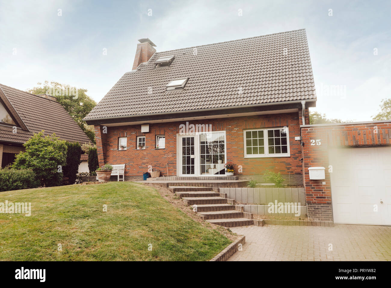 One-family house with garden and driveway Stock Photo