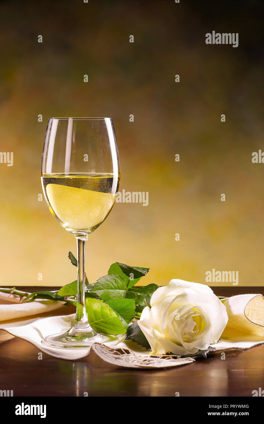 Italy Glass with Spumante and white Rose Stock Photo
