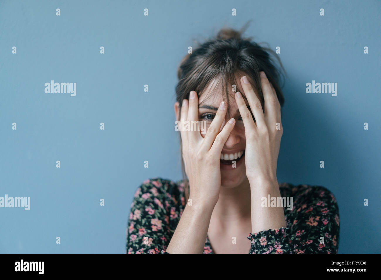 Beautiful woman covering face, portrait Stock Photo