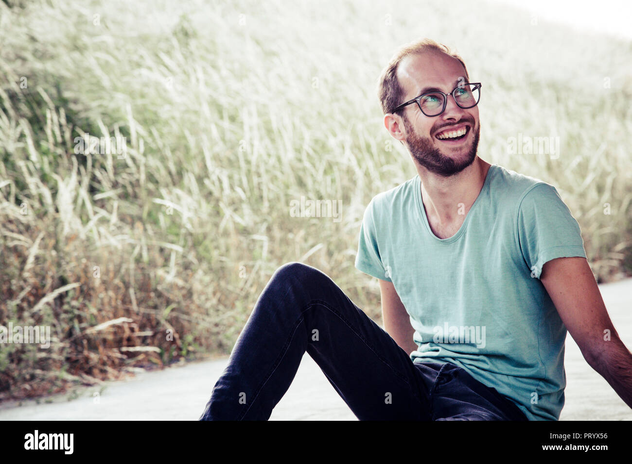 Portrait of laughing man outdoors Stock Photo