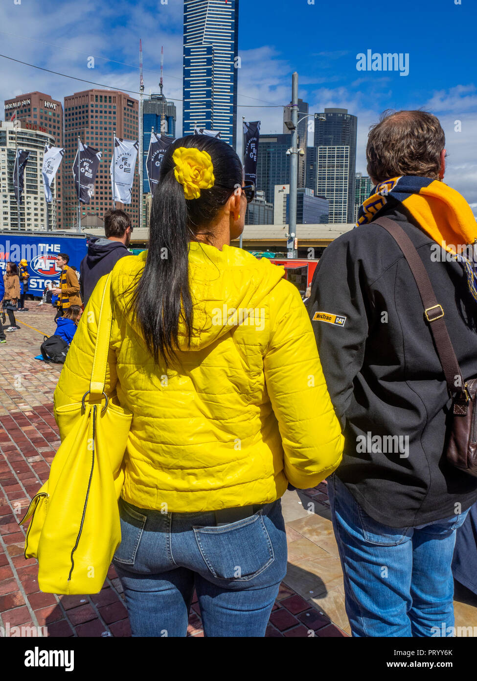 West Coast Eagles fans gathering at Federation Square prior to marching together to the 2018 AFL Grand Final. Stock Photo