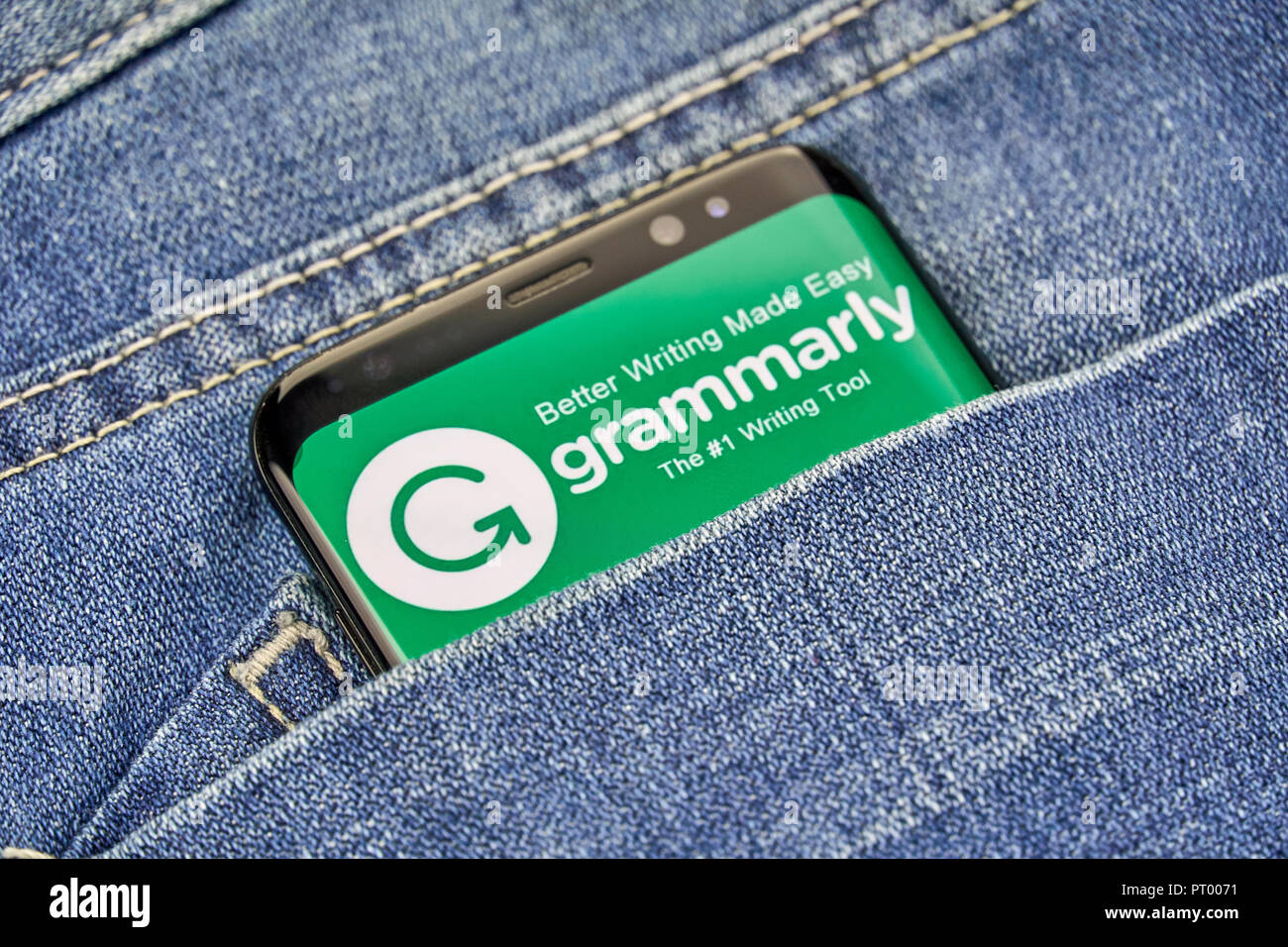 MONTREAL, CANADA - OCTOBER 4, 2018: Grammarly check logo and app on a Samsung s8 screen. Grammarly is a popular English-language writing-enhancement s Stock Photo