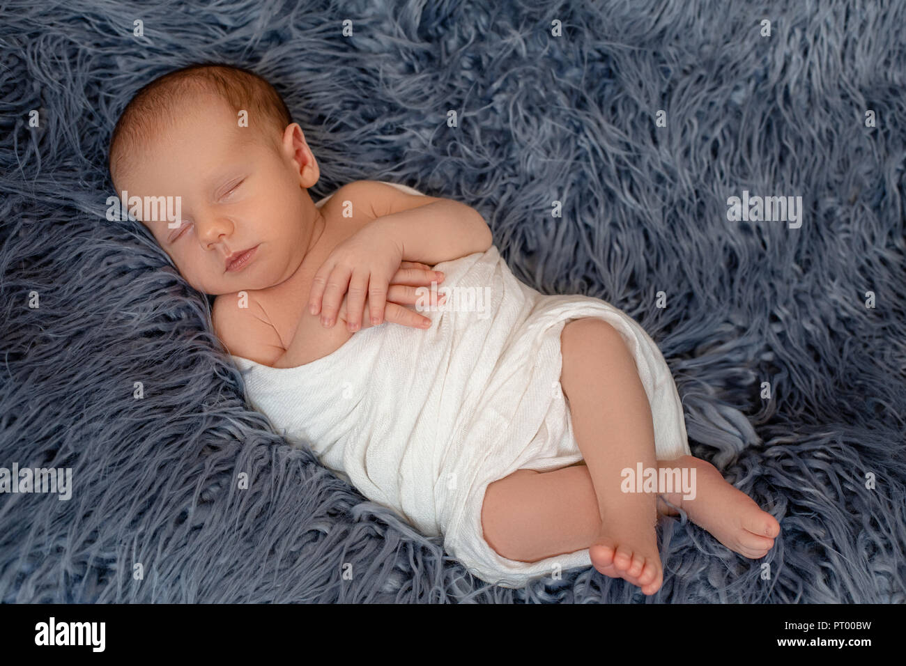 Sleeping new born baby boy hospital hires stock photography and images