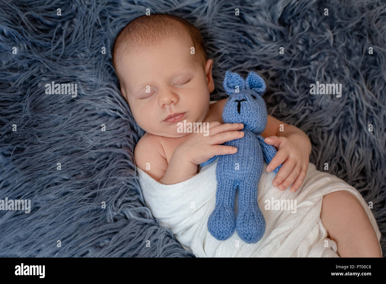 Sleeping new born baby boy hospital hires stock photography and images