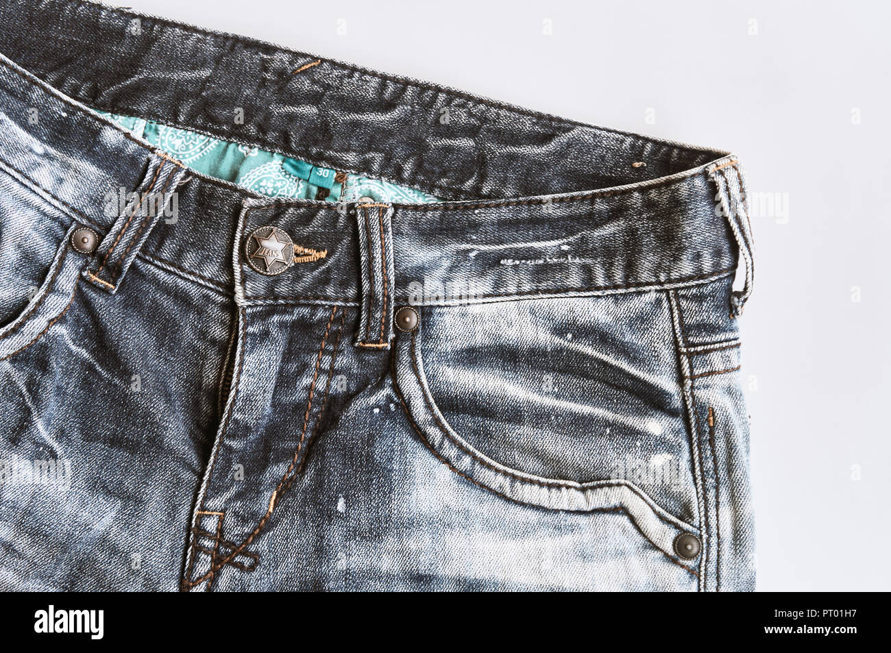 Vintage denim black bleached jeans texture with seam, sewing, pocket