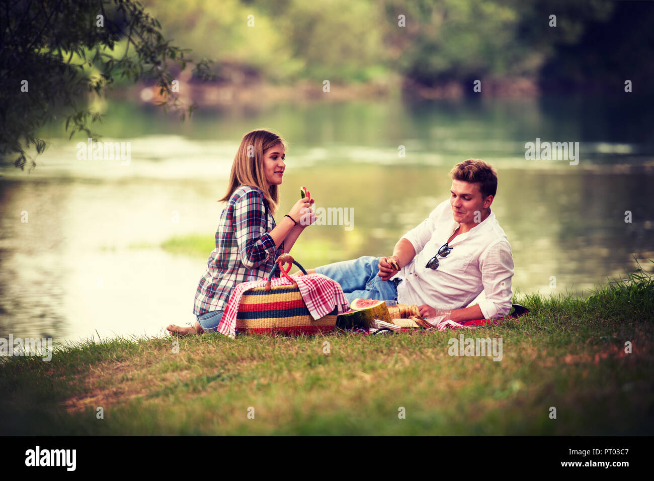 love enjoying picnic time drink and food beautiful nature on the river bank Stock Photo - Alamy