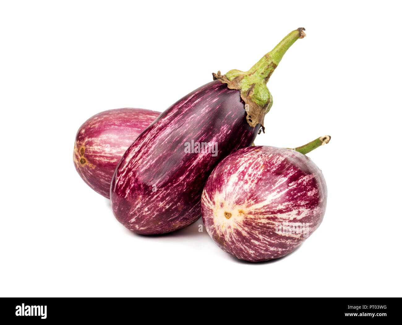 Three fresh purple eggplant graffiti on white background Stock Photo