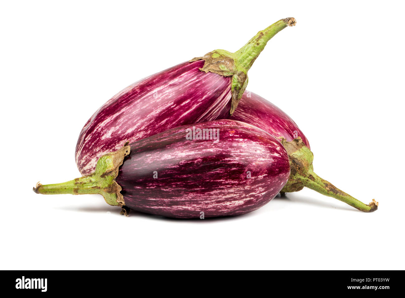 Three fresh purple eggplant graffiti on white background Stock Photo