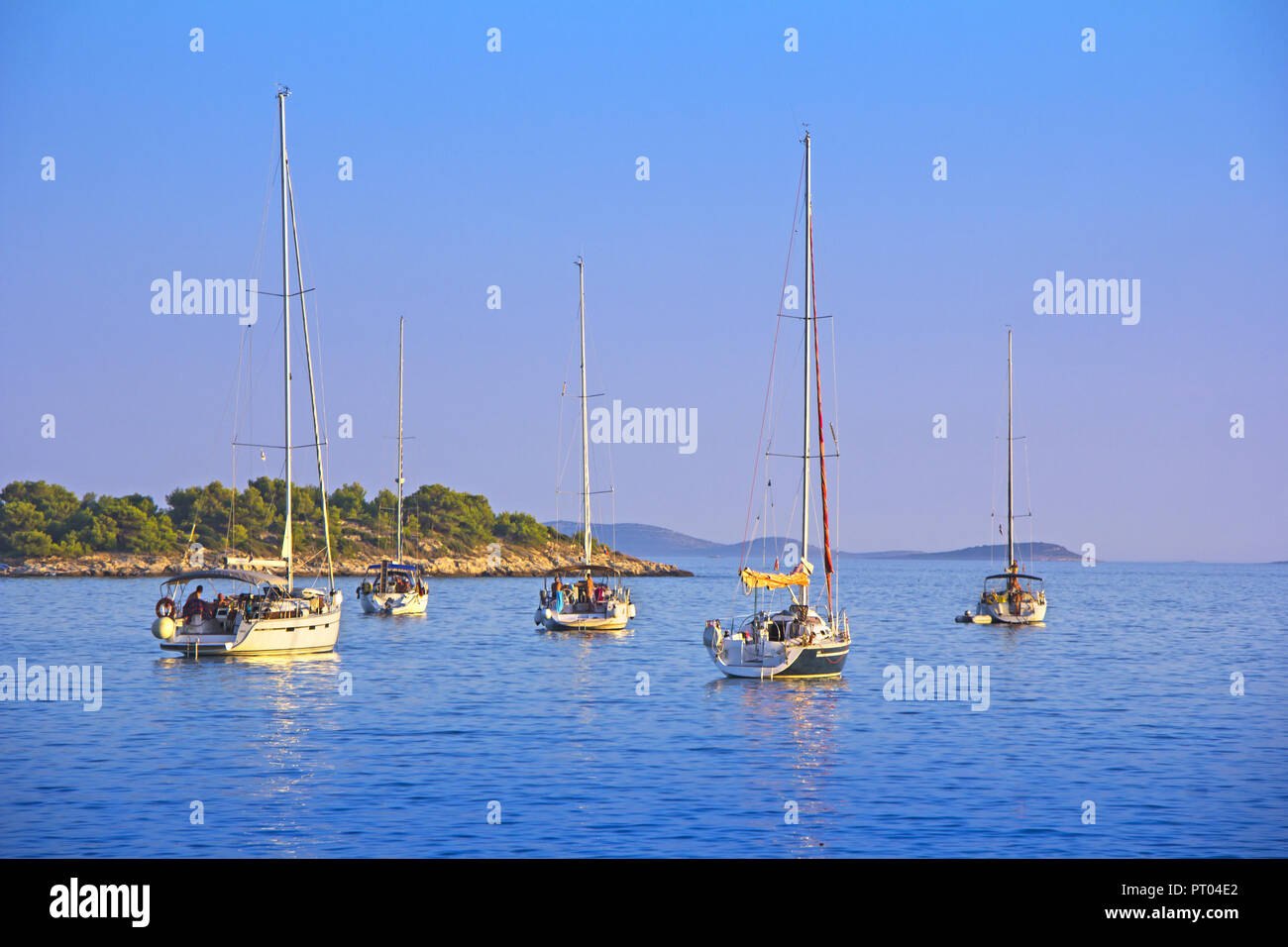 Anchored sailing boats in the bay on island Murter, Croatia Stock Photo