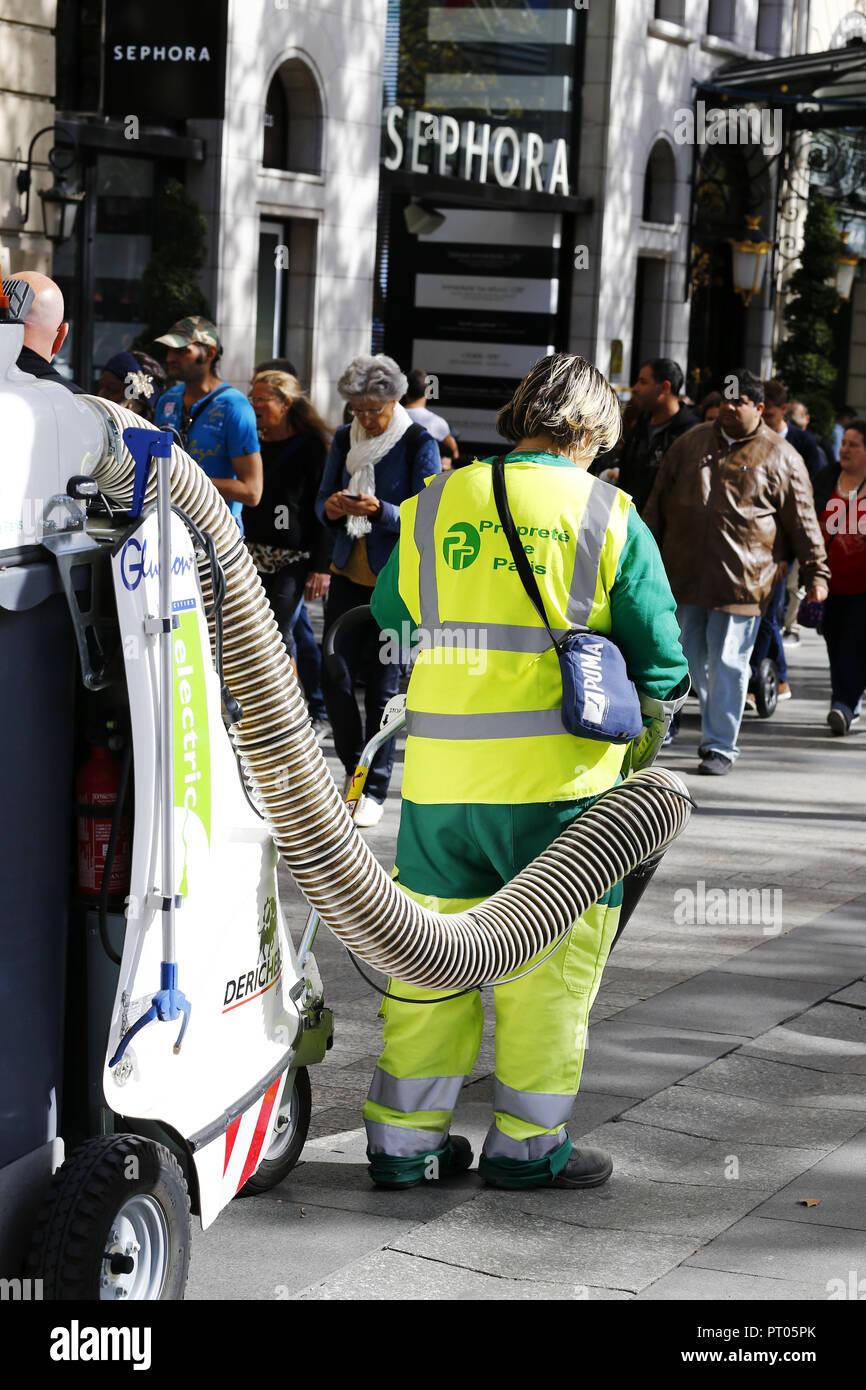 Electric street cleaner on les Champs-Elysées - Paris - France Stock Photo  - Alamy