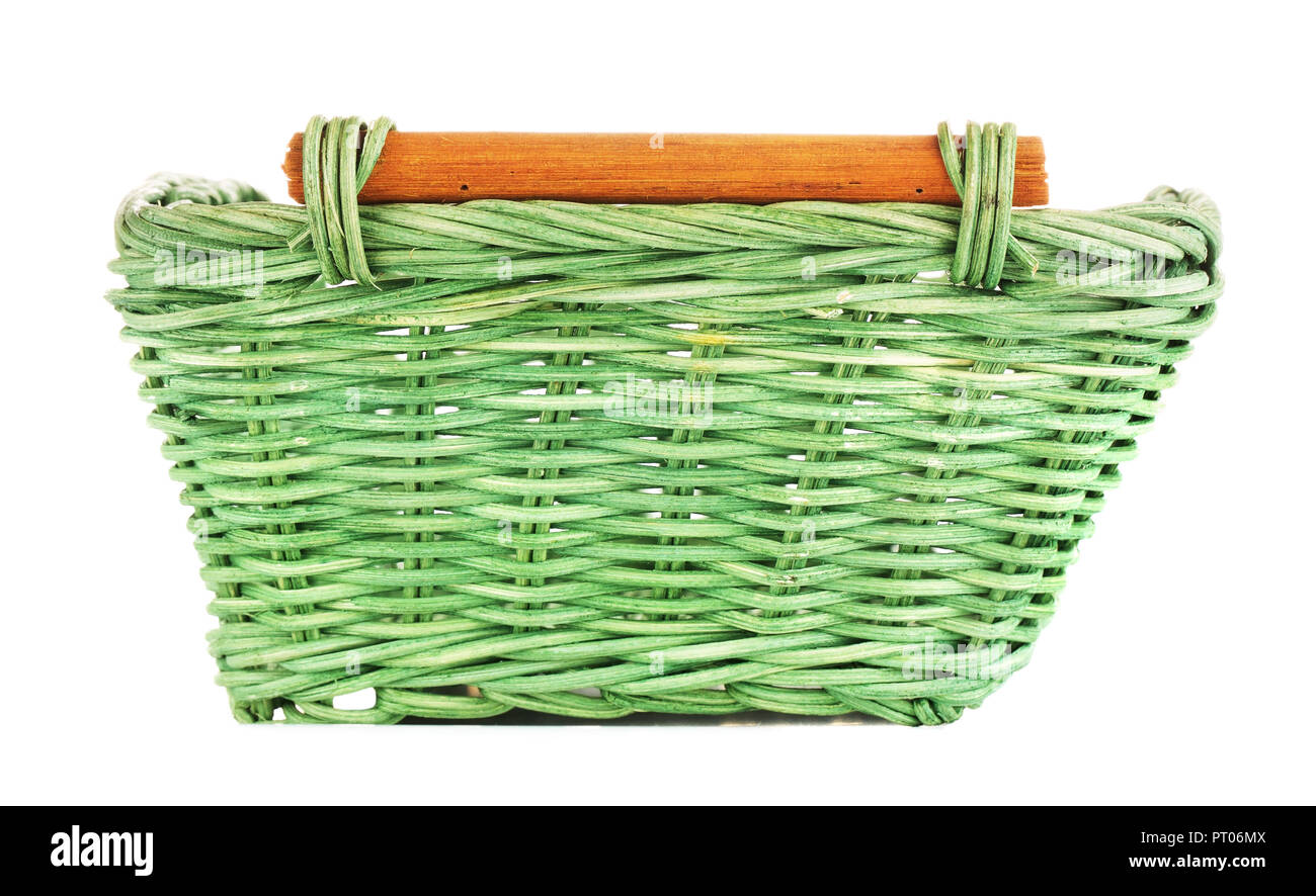 green wooden basket, isolated on white background Stock Photo