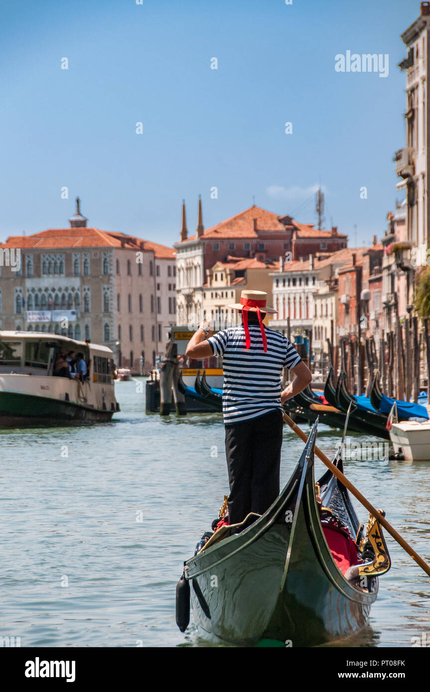 The Gondola is a traditional, flat-bottomed Venetian rowing boat it is the most common watercraft within Venice. Stock Photo