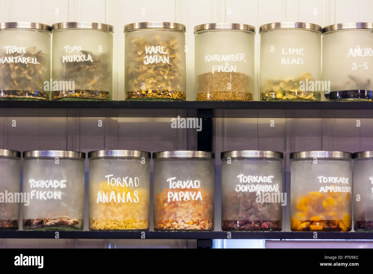 Dried fruits and vegetables cans on a shelf in a shop in Stockholm