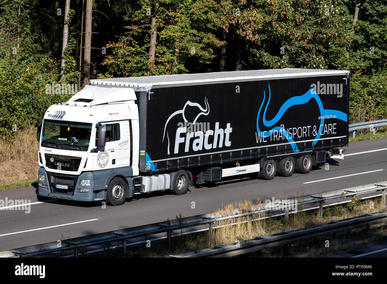 Fracht truck on motorway. Founded in 1992, Fracht is a reputable company in the transportation industry, freight forwarding and logistics. Stock Photo