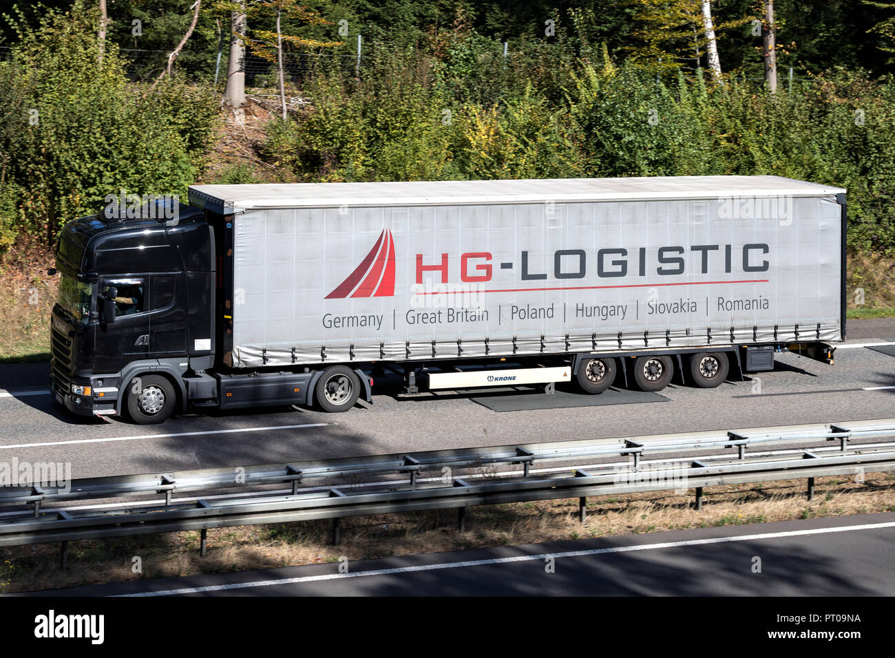 HG Logistik truck on motorway. Hämmerling Group Logistic GmbH is a medium-sized forwarding agency with approx. 350 employees. Stock Photo