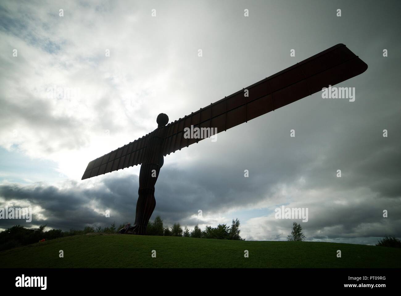 The view looking up at the Angel of the North statue/sculpture in Tyneside, near Newcastle. The famous landmark in England. Stock Photo