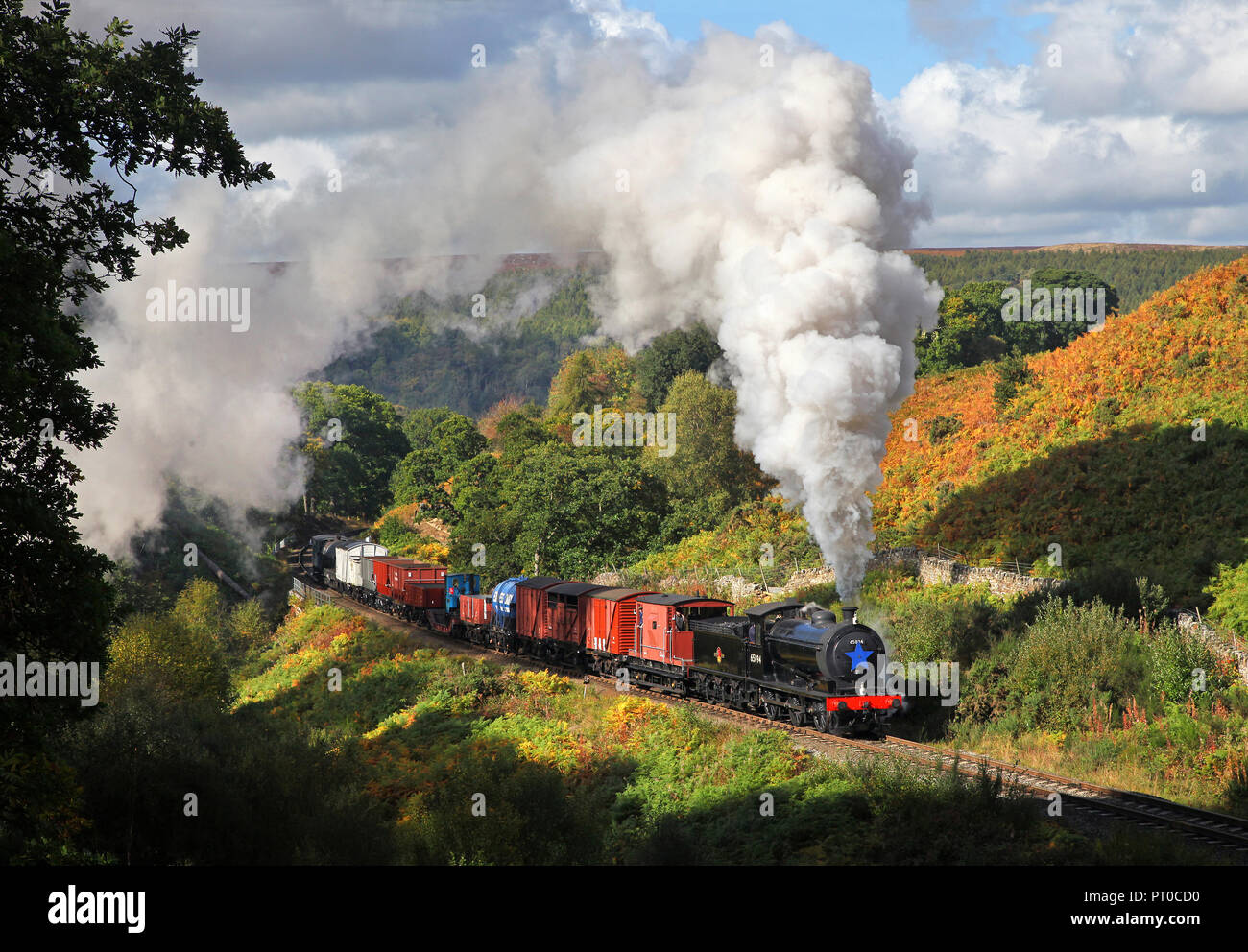 J27 65894 heads a mixed freight past Thomason Foss on 28.9.18. Stock Photo