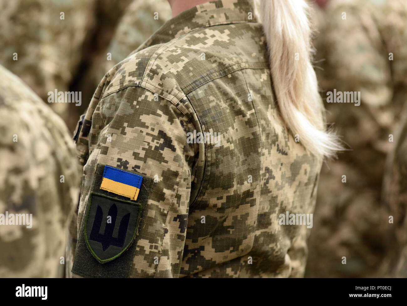 Woman soldier. Woman in army. Ukraine military uniform. Ukrainian troops Stock Photo