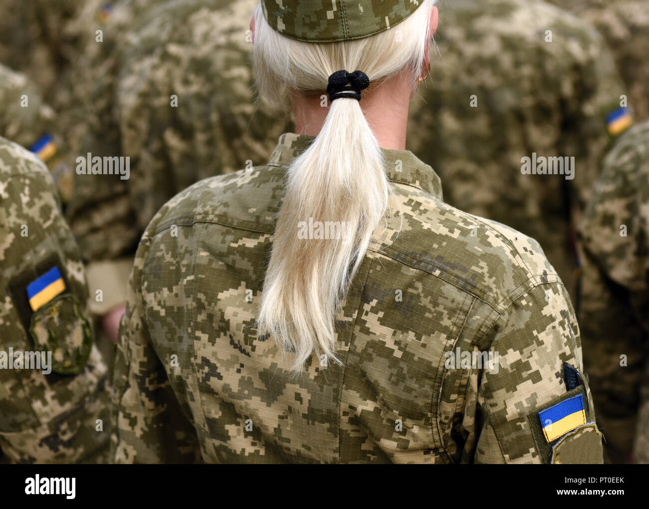 Woman soldier. Woman in army. Ukraine military uniform. Ukrainian troops Stock Photo