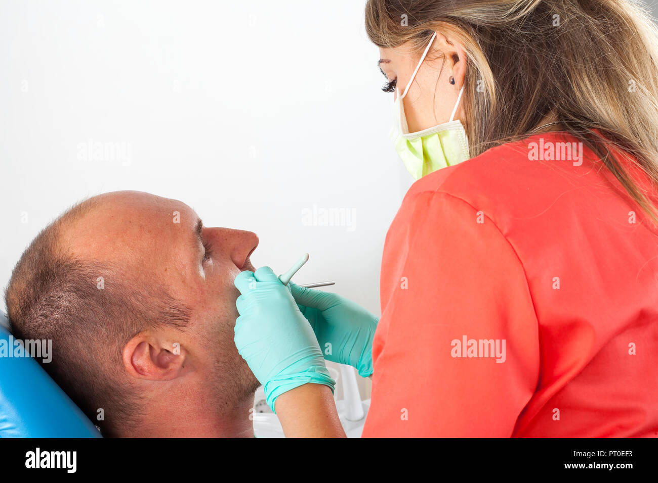 Picture of dentist using drill for dental treatment male patient's oral cavity Stock Photo Alamy