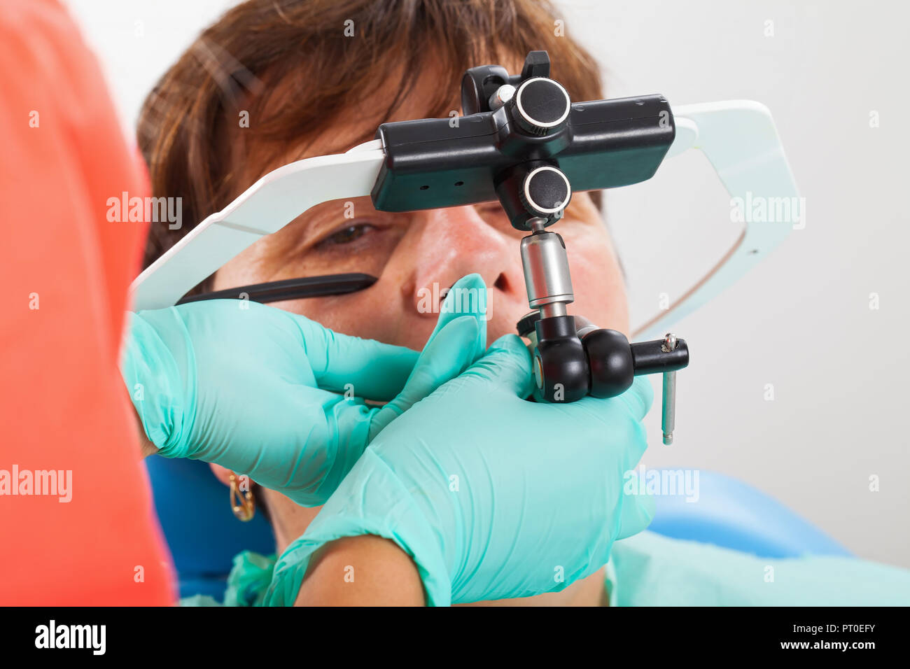 Seniorpatient wearing a facebow for transfer functional and aesthetic