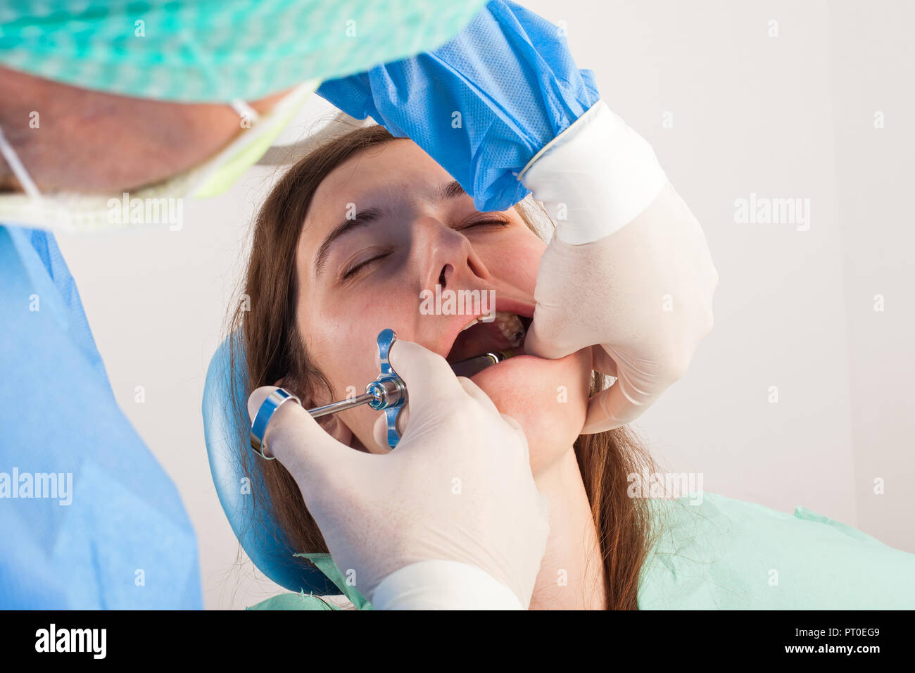 Close up picture of woman at the dentist office receiving local