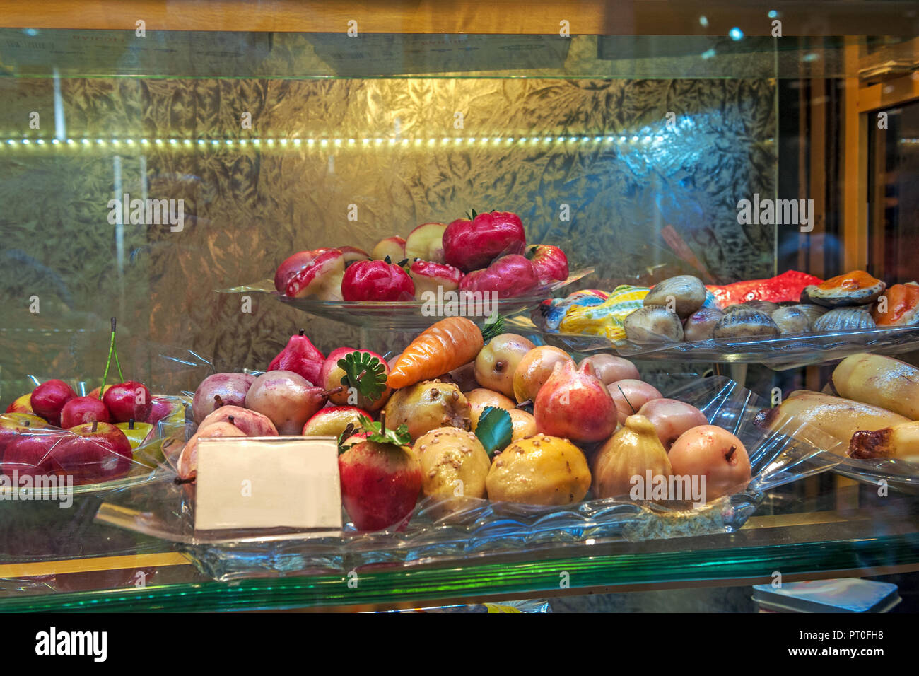 Baking with marzipan in the form of different fruits and fish. Typical Sicilian. Stock Photo