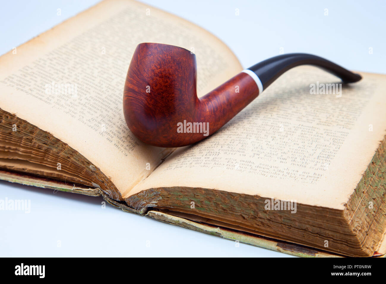 pipe tobacco and open book Stock Photo Alamy