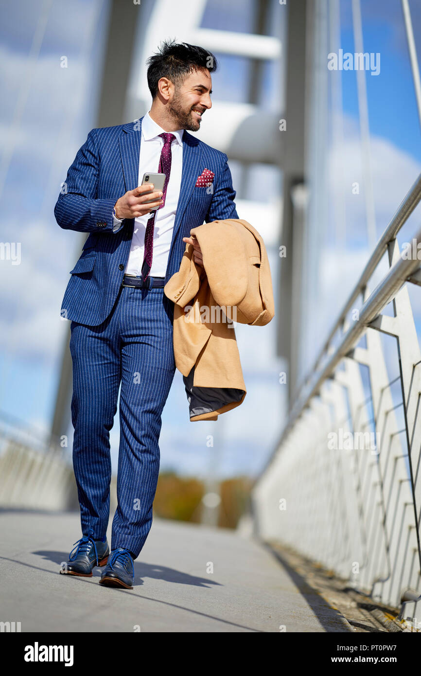 Man walking suit hi-res stock photography and images - Alamy