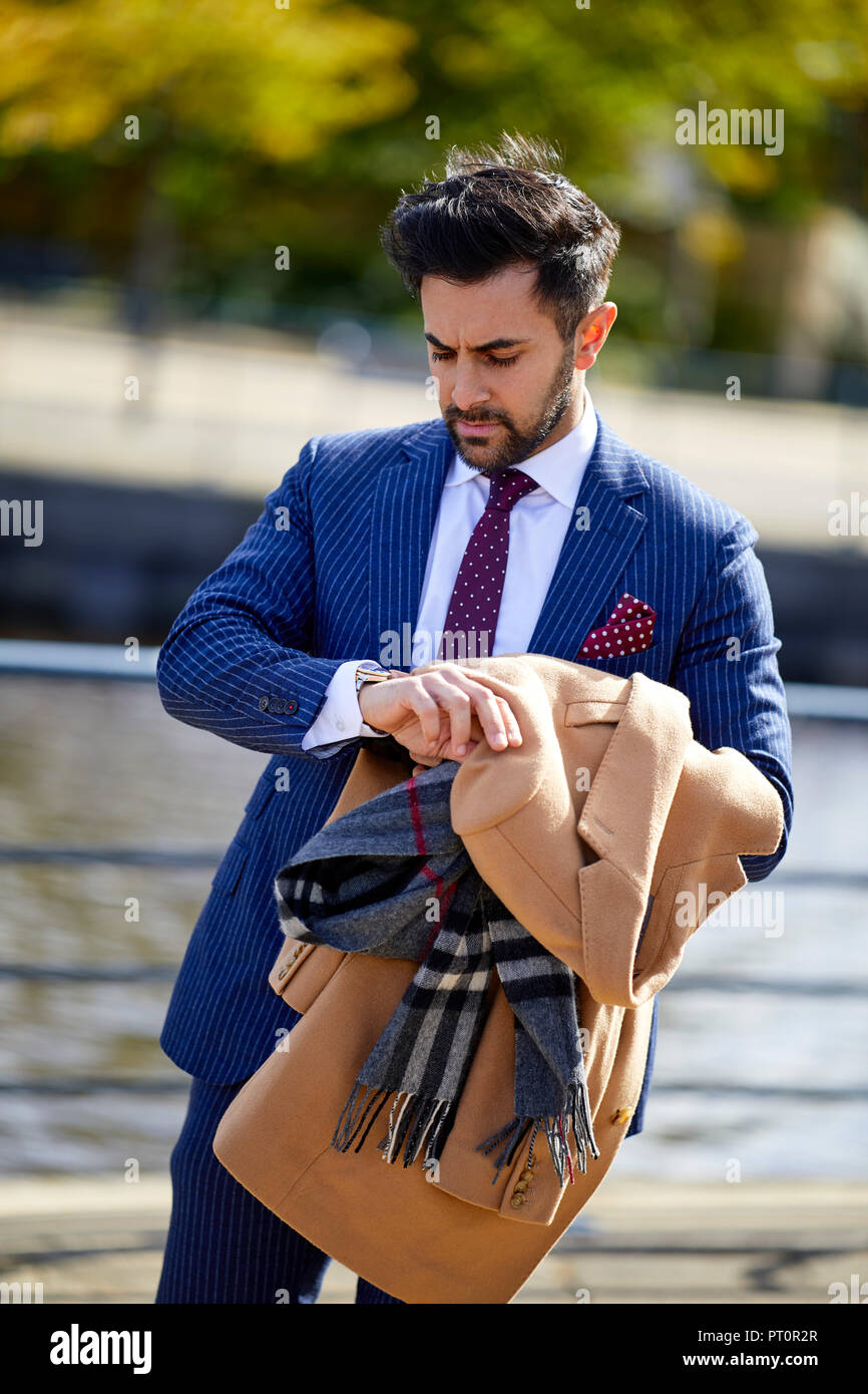 Man walking suit hi-res stock photography and images - Alamy
