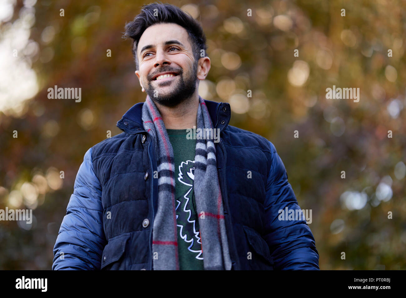 Man walking outdoors Stock Photo