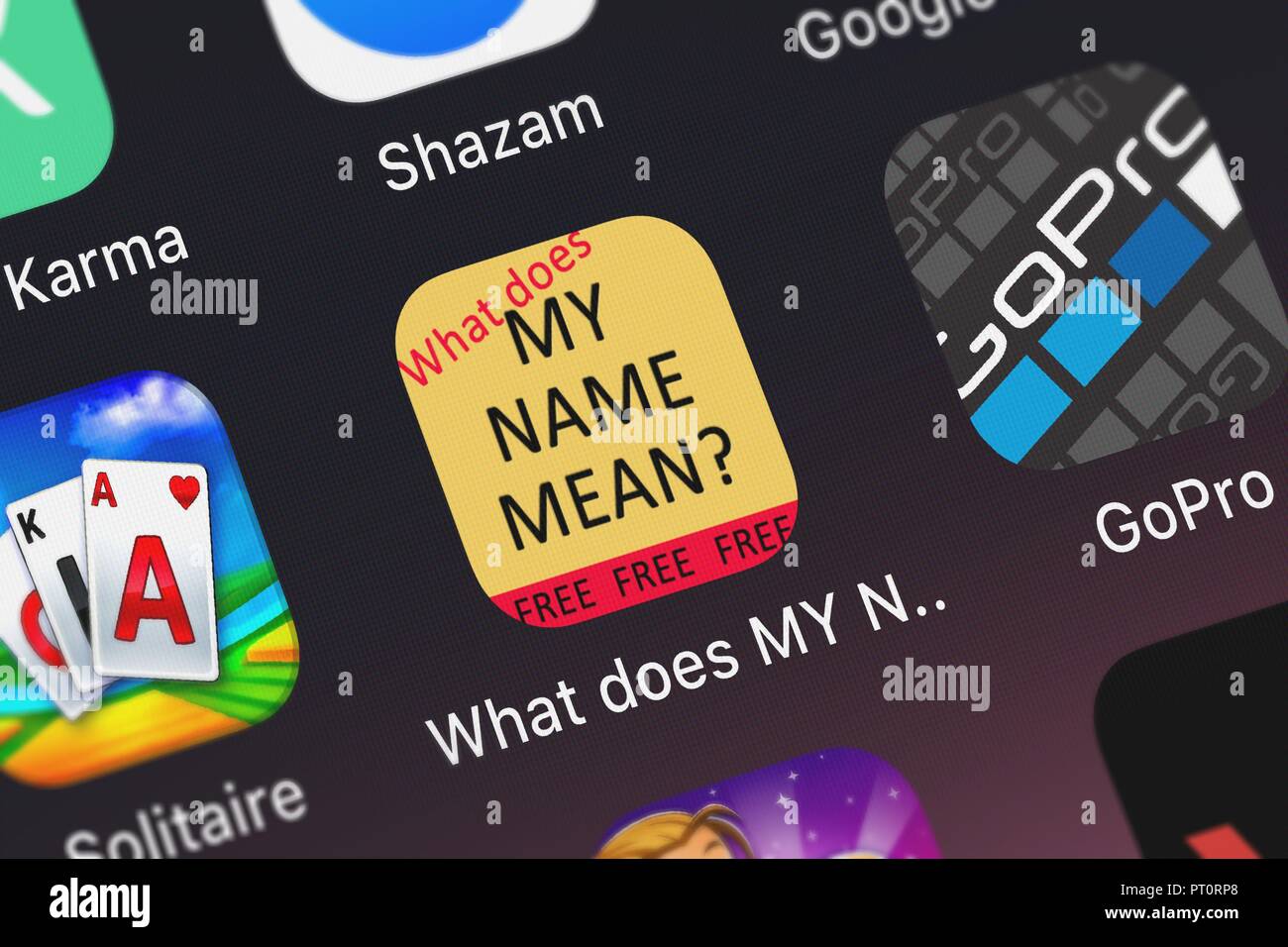 London, United Kingdom - October 05, 2018: The What does MY NAME MEAN mobile app from Indigo Penguin Limited on an iPhone screen. Stock Photo