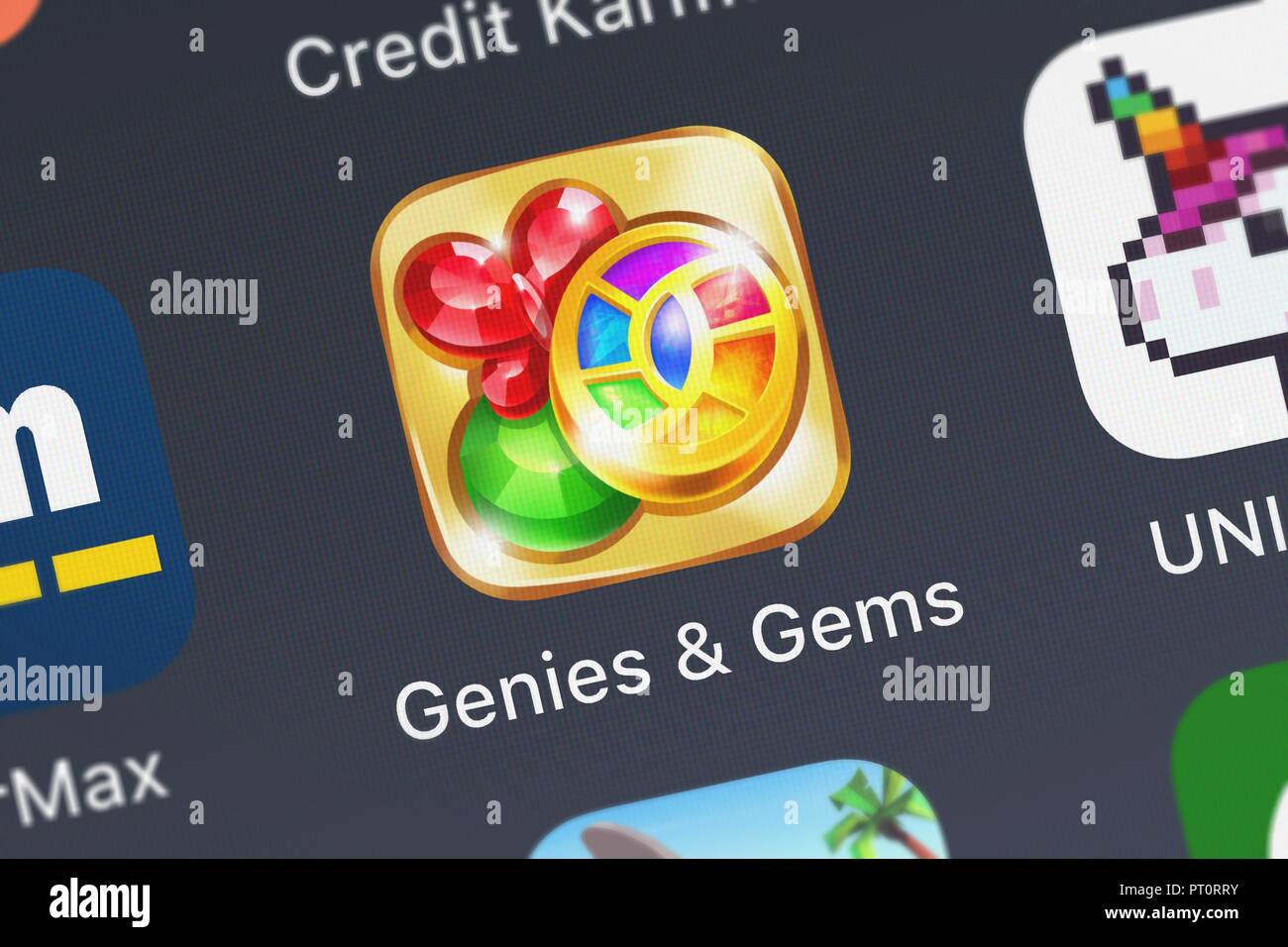 London, United Kingdom - October 05, 2018: Icon of the mobile app Genies  Gems from Jam City, Inc. on an iPhone. Stock Photo