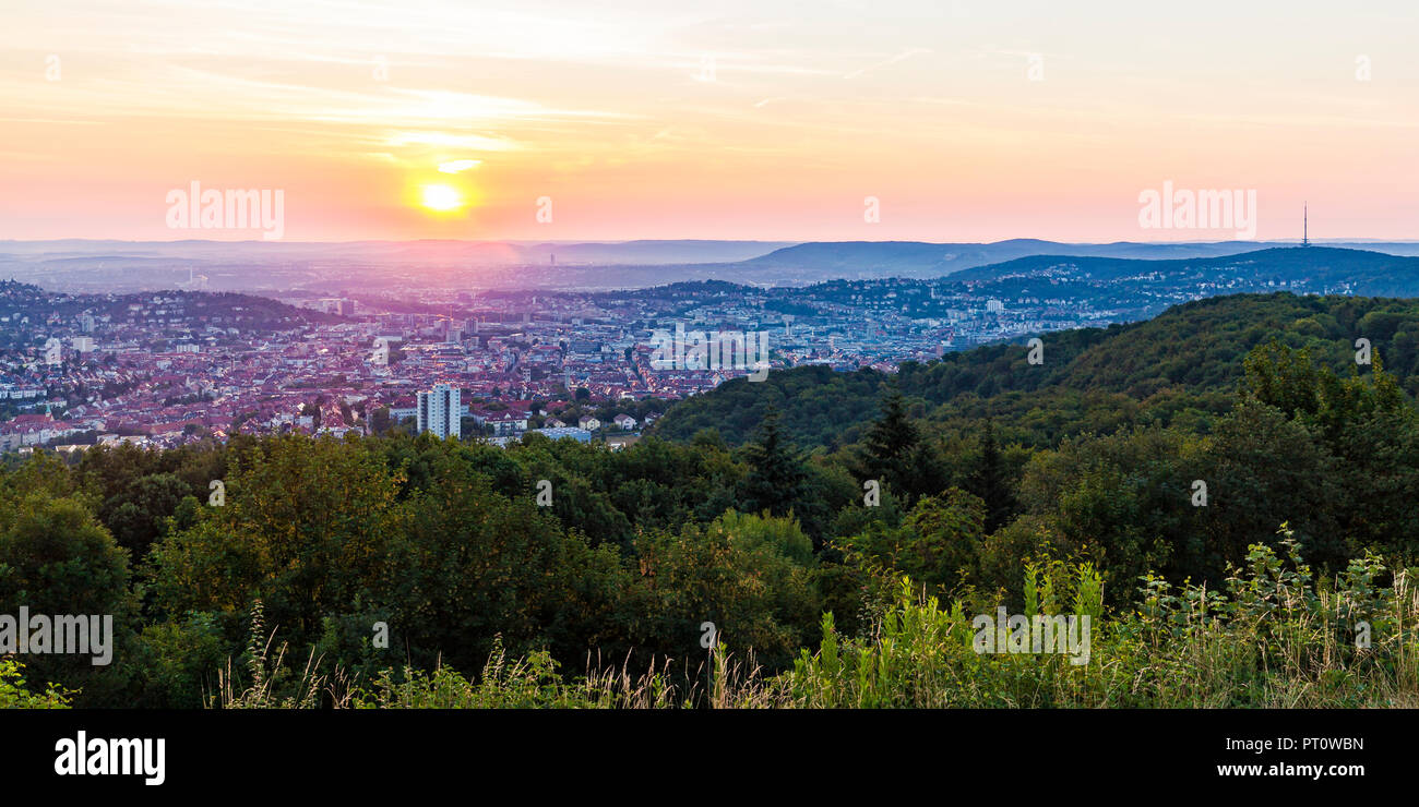 Germany, Baden-Wuerttemberg, cityscape of Stuttgart at sunrise, view from Birkenkopf Stock Photo